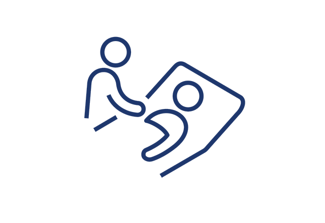 Icon of a healthcare provider caring for a patient in a hospital bed.